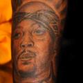 Tetovaža na Snoopovi roki. (Foto: youtube)