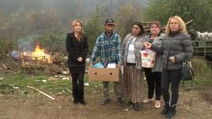 Pomoč romski družini po požaru