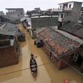 Poplave na Kitajskem. (Foto: Reuters)