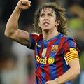 Sport 28.11.10, Barcelona's captain Carles Puyol celebrates after their Spanish 
