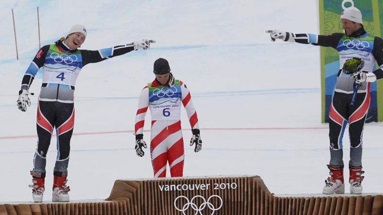 Švicarsko-norveški zmagovalni oder v veleslalomu. (Foto: Reuters)