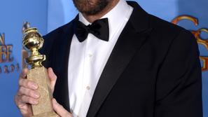 scena 14.01.13. hugh jackman, Australian actor Hugh Jackman holds his Golden Glo