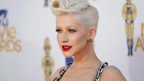 Ženske se ji zdijo privlačnejše od moških, a vseeno ljubi svojega moža. (Foto: R