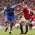 Didier Drogba in Jonny Evans