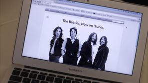 Po letih pogajanja so The Beatles končno izšli na Applovi aplikaciji iTunes. (Fo