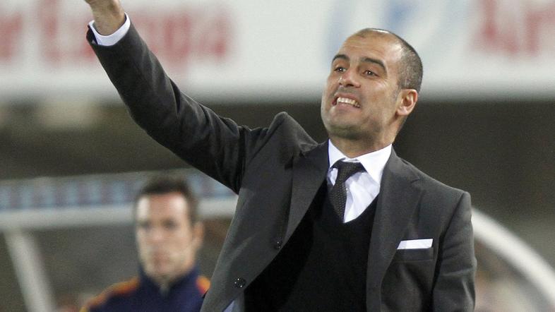 Pep Guardiola je le s težavo v sredo vodil svoje fante v Valencii. (Foto: Reuter