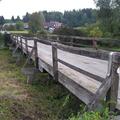 Most je kot eden redkih v celoti lesenih na reki Krki vpisan v register nepremič