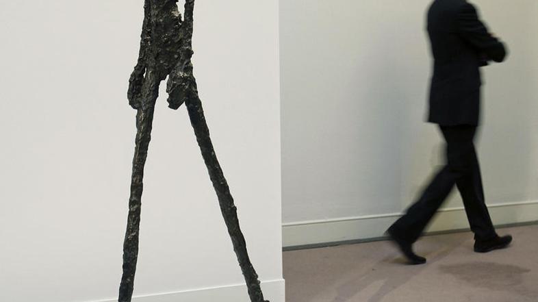 Bronasta skulptura moškega (Foto: Reuters)