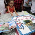 Fidel Castro, 85. rojstni dan, deklica reže torto