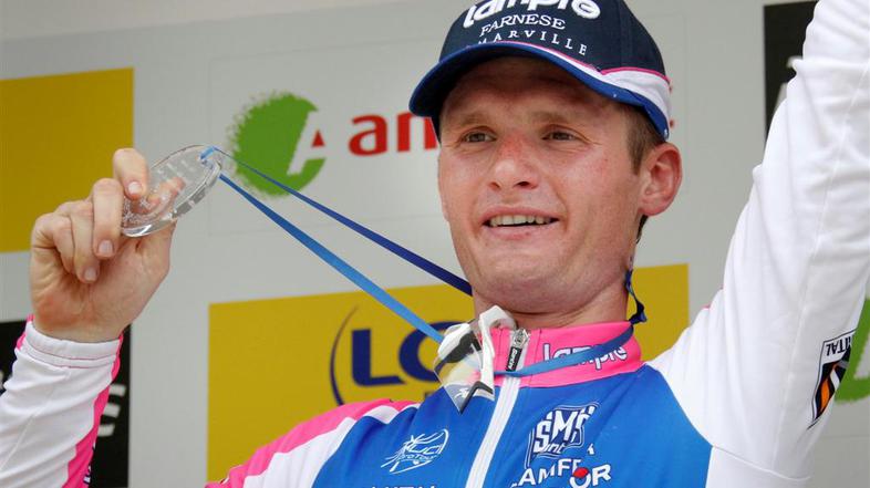 Grega Bole je v cilj prikolesaril v času zmagovalca. (Foto: Reuters)