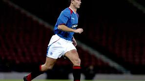 Brian Laudrup v majici škotskega kluba Glasgow Rangers, kjer je preživel najlepš
