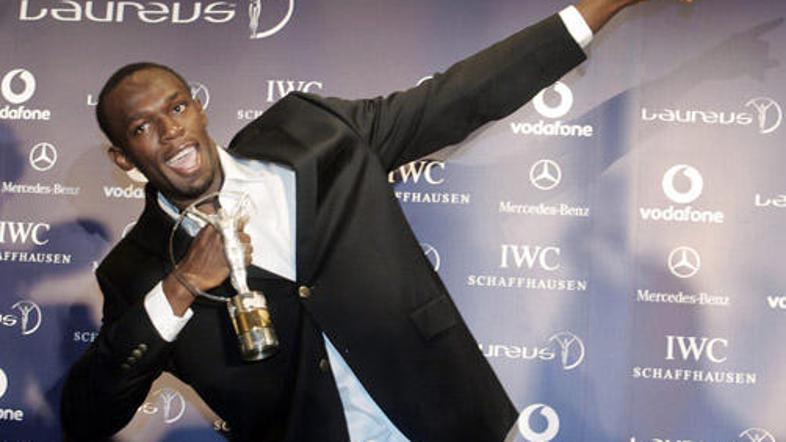 Usain Bolt je s ponosom poziral z laureusom.