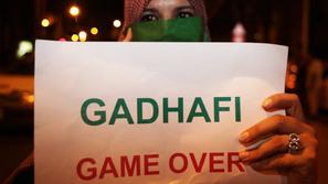Protestnica proti Gadafiju.