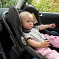 Otrok v otroškem sedežu