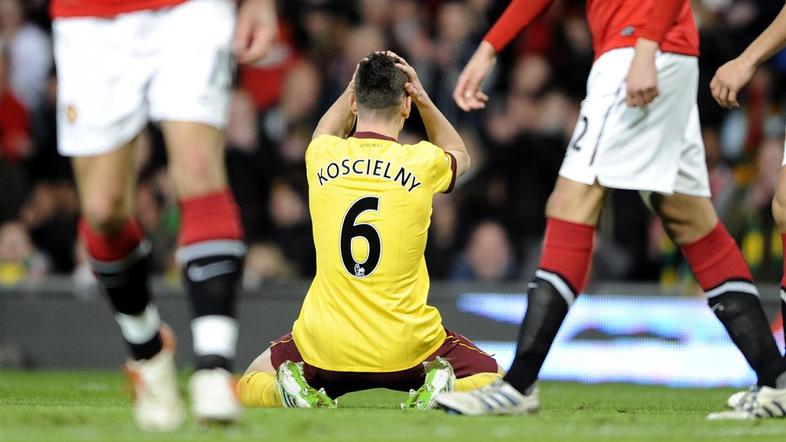 Laurent Koscielny in obup Arsenala, ki je končal še tretje tekmovanje v 14 dneh.