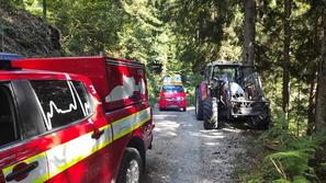 Rudno, občina Železniki, nesreča v gozdu, traktor, reševanje