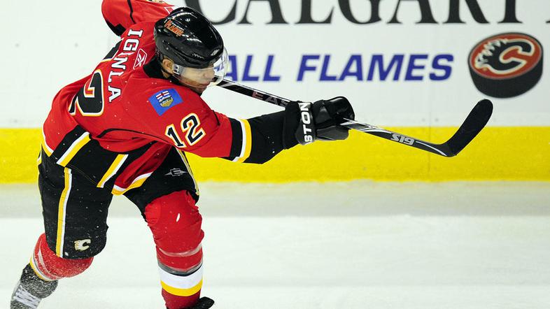 Jarome Iginla in soigralci ohranjajo upe na uvrstitev v končnico. (Foto: Reuters