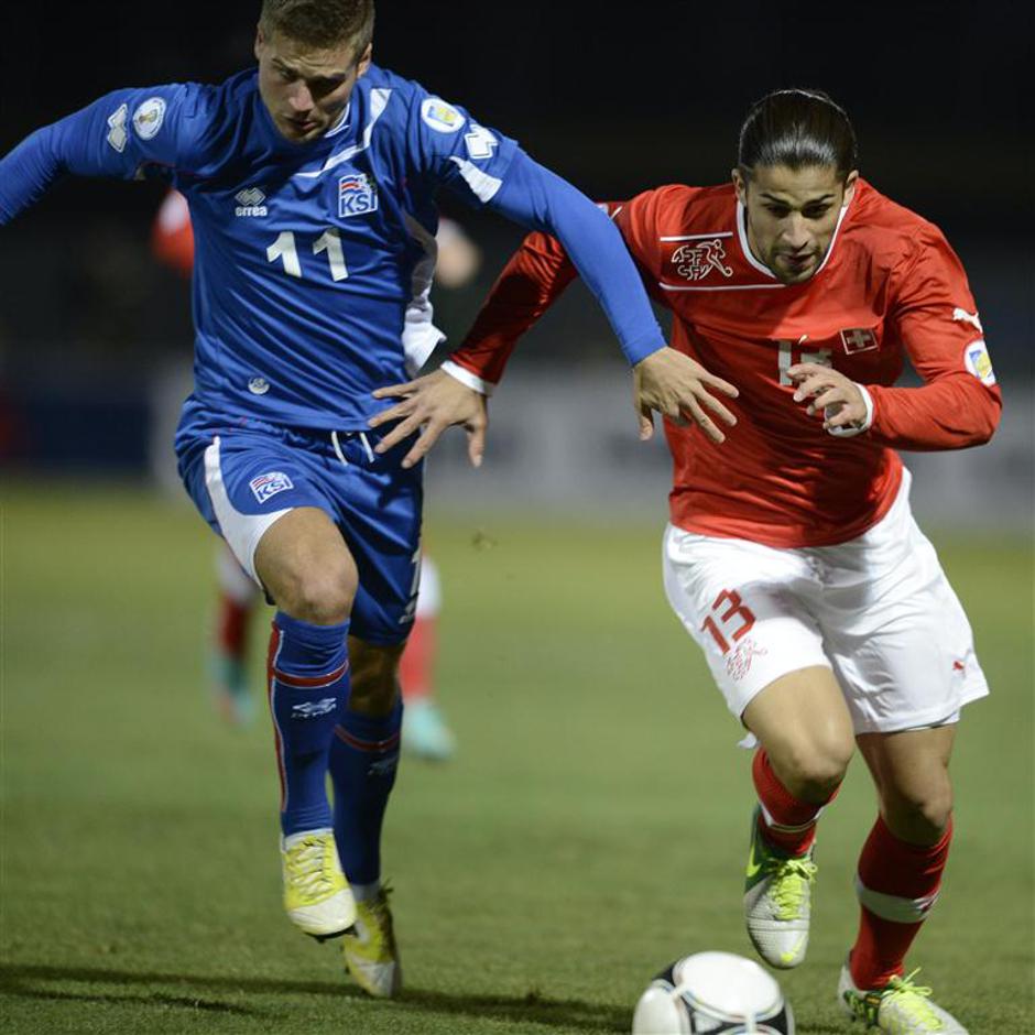 Gislason Rodriguez Islandija Švica kvalifikacije SP 2014 Reykjavik | Avtor: EPA