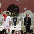 Olimpijski ogenj je prišel v Peking, od koder odhaja na dolgo pot po svetu.