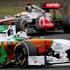 Adrian Sutil (Force India) in Lewis Hamilton (McLaren)