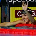 Natalie Coughlin se ob postavitvi novega rekorda zasluženo smeje.