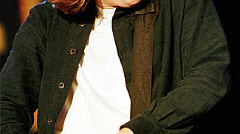 Slepega Healeyja je odlikovala posebna tehnika igranja na kitaro: vodoravna drža