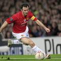 Ryan Giggs je v Manchestru že 20 let in bo kot igralec vsaj še eno leto. (Foto: 