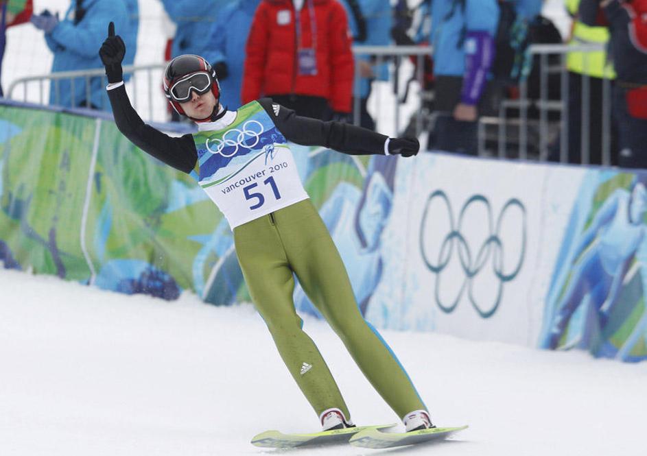 Zmagovalec Simon Ammann. (Foto: Reuters)