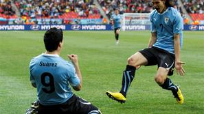 Tokratni urugvajski junak - Luis Suarez (levo). (Foto: Reuters)