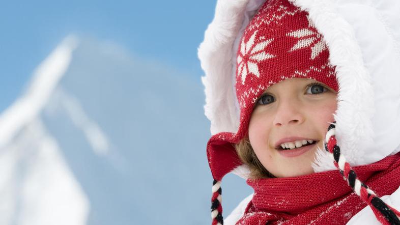 Otroška koža pozimi potrebuje pravilno nego. (Foto: Shutterstock)