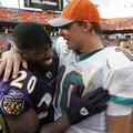 Tragični junak tekme v Miamiju, Chad Pennington (desno), in pravi junak, Ed Reed