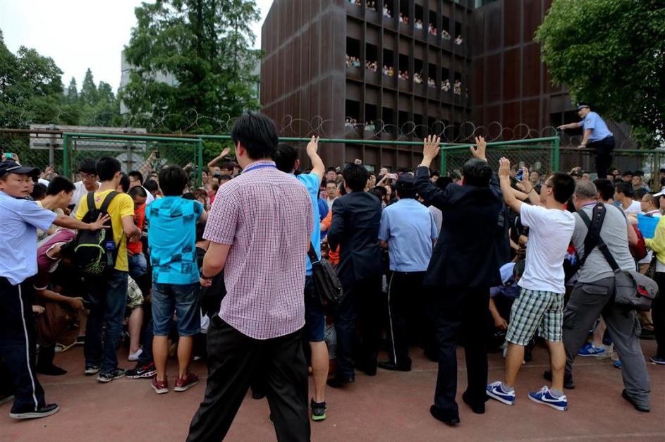 Univerza Tongji Kitajska Šanghaj David Beckham kaos stampedo incident