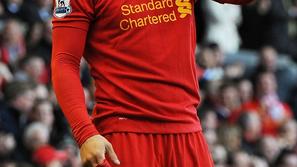 sport 22.04.13. Luis Suarez, nogometas Liverpoola, Liverpool's Luis Suarez (R) g