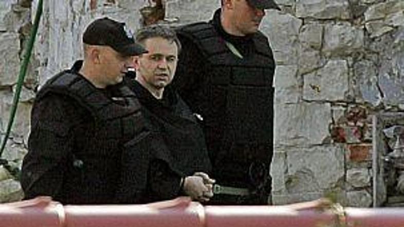 Policija je nekdanjega frančiškanskega redovnika Romana Komaryczko aretirala.
