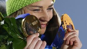 sport 19.02.14. Gold medallist Slovenia's Tina Maze celebrates during the victor