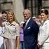 Princess Madeleine waves during a reception on her 25th birthday, walking betwee
