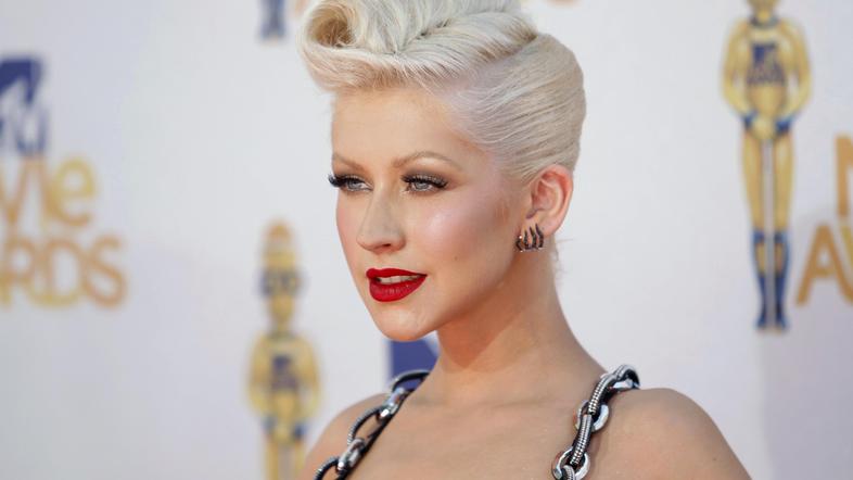 Ženske se ji zdijo privlačnejše od moških, a vseeno ljubi svojega moža. (Foto: R