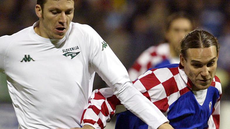Fabijan Cipot in Dado Pršo med bojem druge kvalifikacijske tekme za euro 2004. F