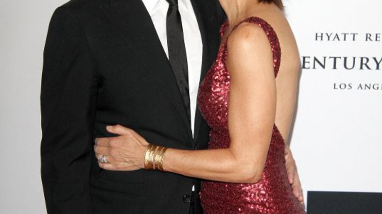 Lisa Rinna in Harry Hamlin