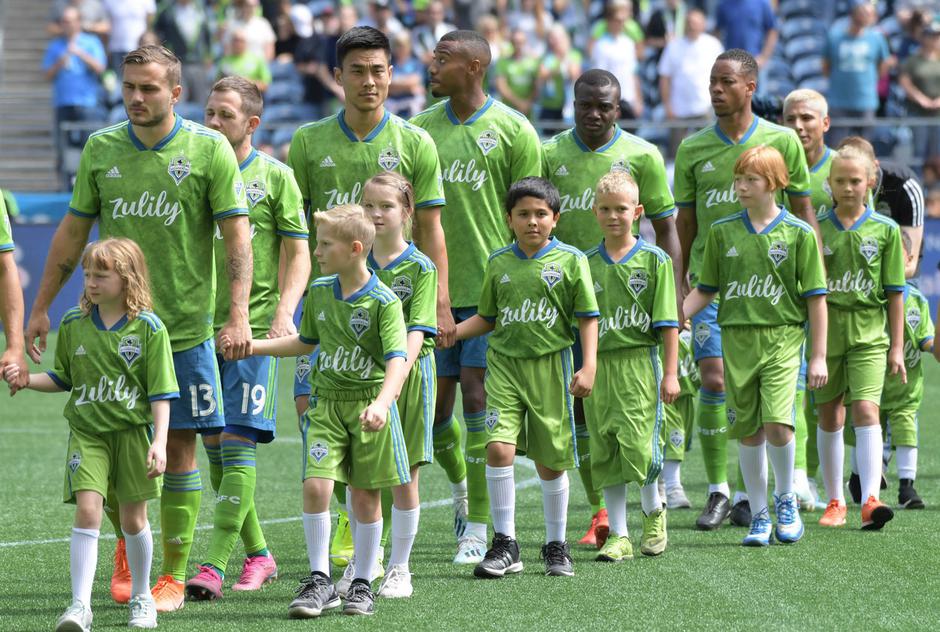 Otroci in nogometaši | Avtor: Profimedia