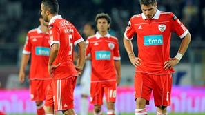 Razočaranje nogometašev Benfice po zadnjem porazu proti Guimaraesu. (Foto: Reute
