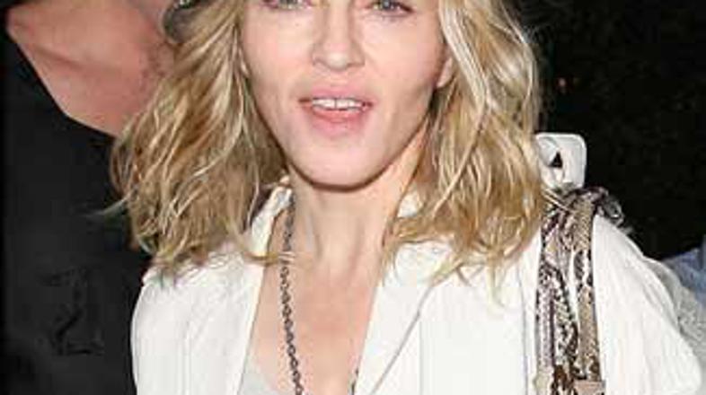 Madonni je dovolj težav, ki so se vrtele okrog Tracy.