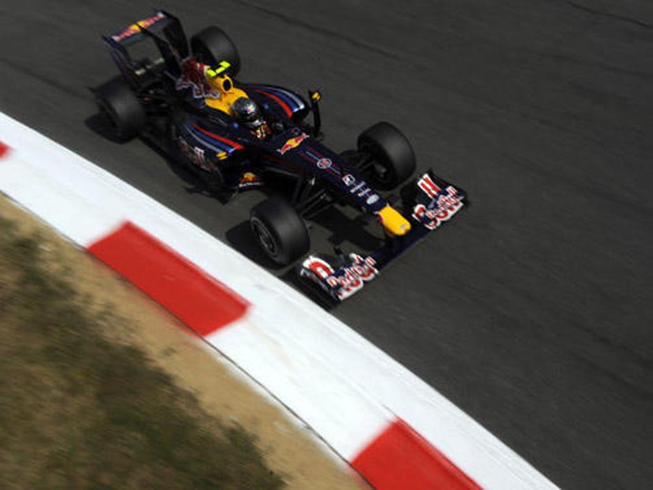 Sebastian Vettel je bil v Monzi šele osmi, a še verjame v naslov prvaka.