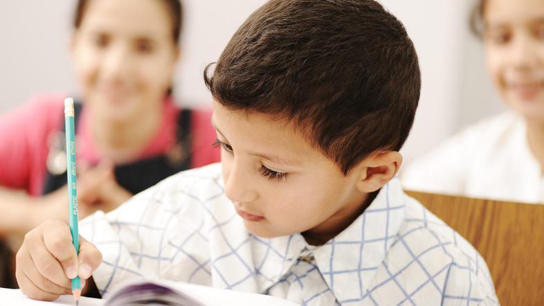 otrok pisanje šola test