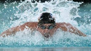 Michael Phelps se je s plavanjem začel ukvarjati pri sedmih letih po prigovarjan