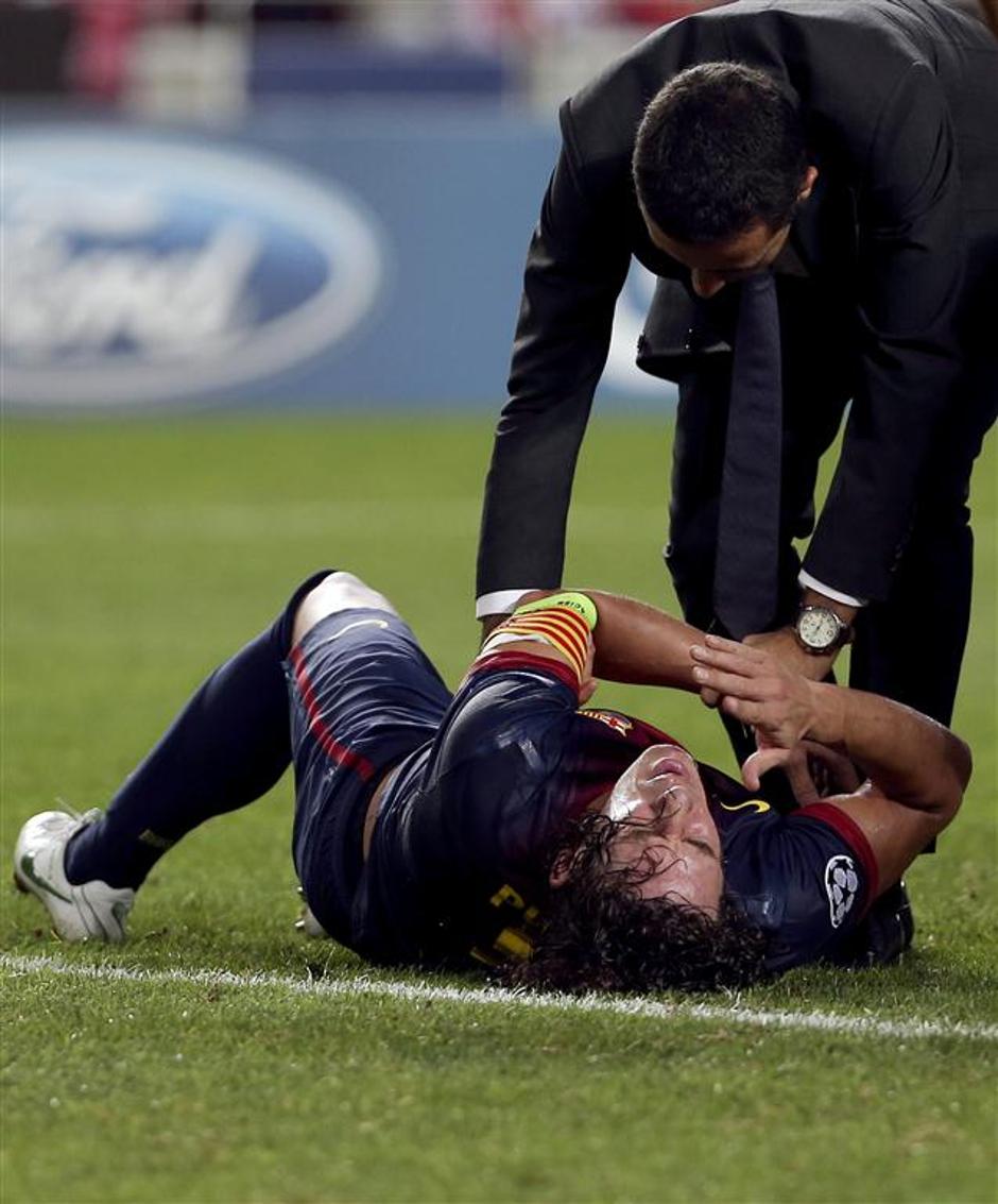 Puyol poškodba zdravnik izpah Benfica Barcelona Liga prvakov | Avtor: EPA