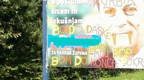 Oskrunjen plakat