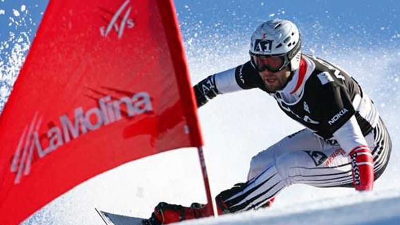 Avstrijec Andreas Prommegger je zmagovalec paralelnega veleslaloma v sončni La M