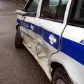 Poškodovan policijski avto