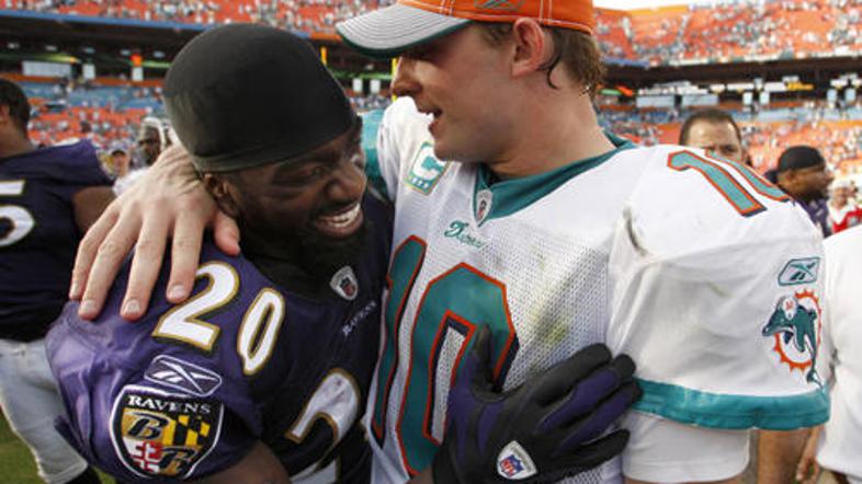 Tragični junak tekme v Miamiju, Chad Pennington (desno), in pravi junak, Ed Reed